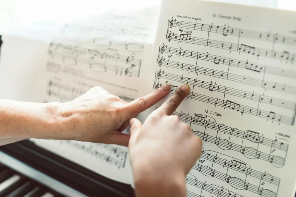 music-lesson-reading-sheet-music-piano